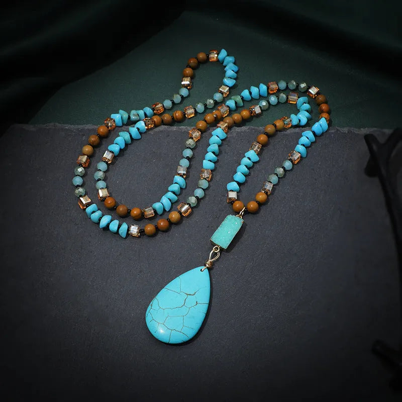 Turquoise blue geometric pendant necklace with ball bead chain measuring 81cm length