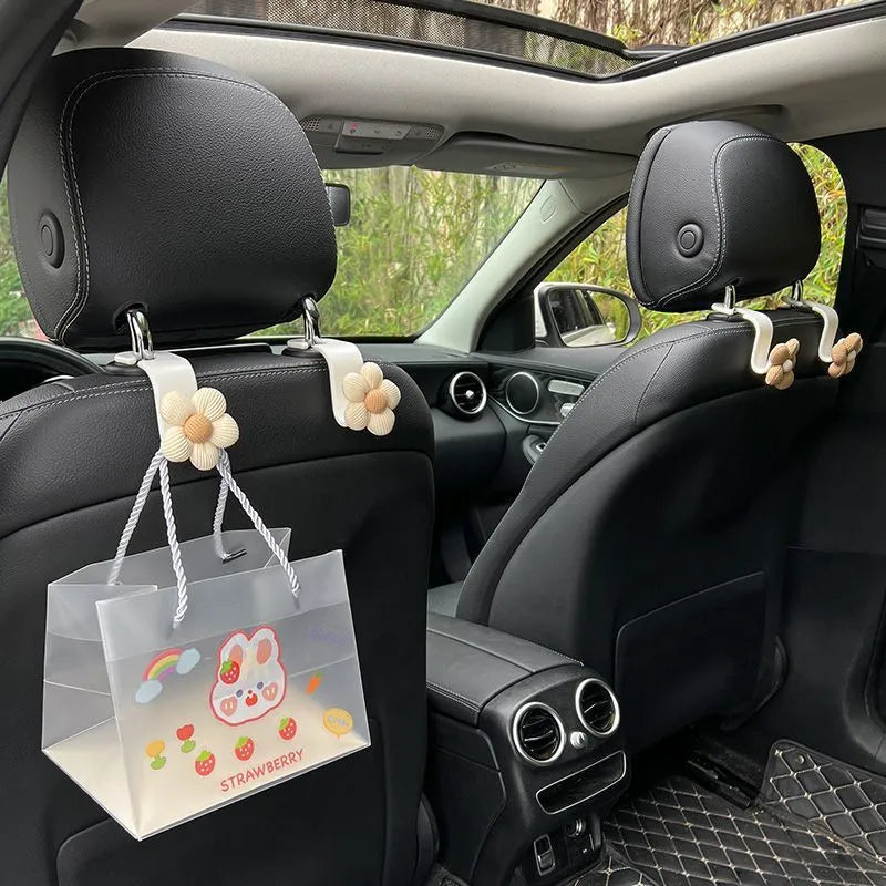 Plastic car seat hook in white Xuan Ya flower colour, 11x5.5cm, for hanging storage on seat back