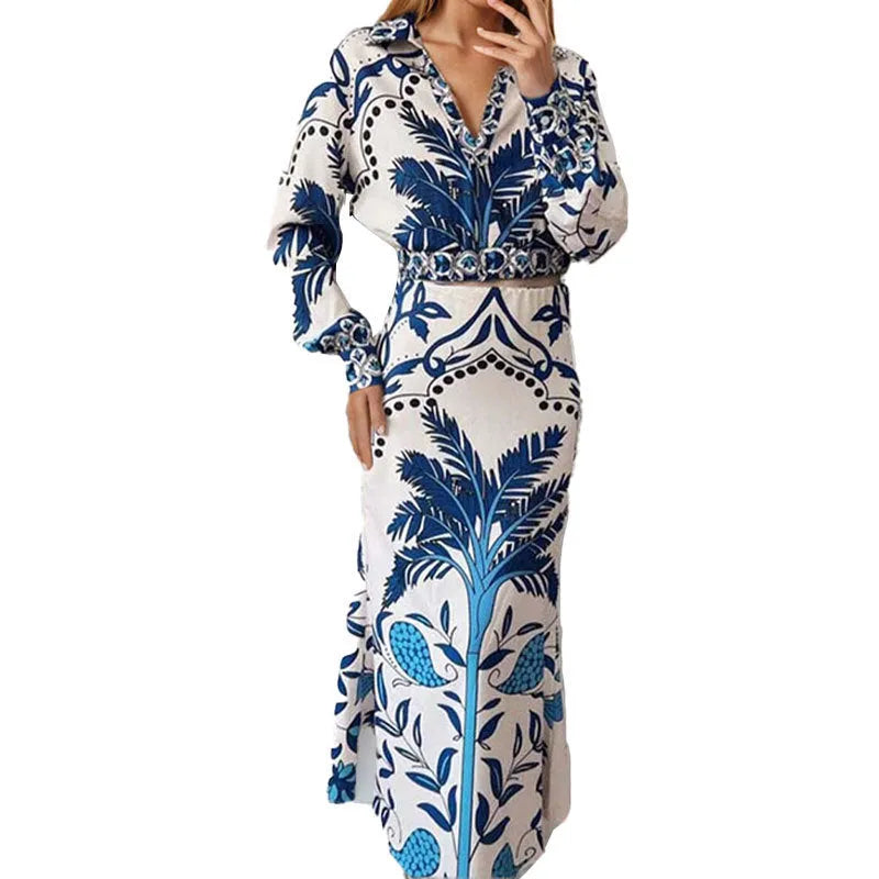 Women's floral print polyester co-ord set with long sleeves and a long skirt on a hanger.