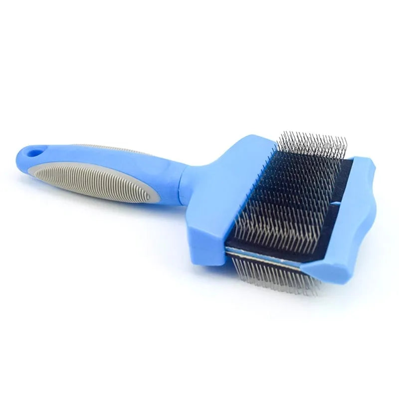 Blue double-sided pet brush with stainless steel pins and ergonomic grip on a white background