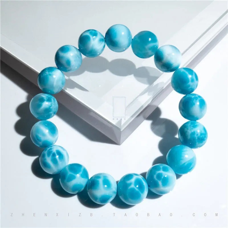 Blue Bodhi bracelet with natural crystal sea-pattern stones and pearl accents in Maillard style design