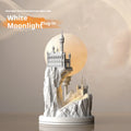 White composite gypsum table night lamp on a surface.