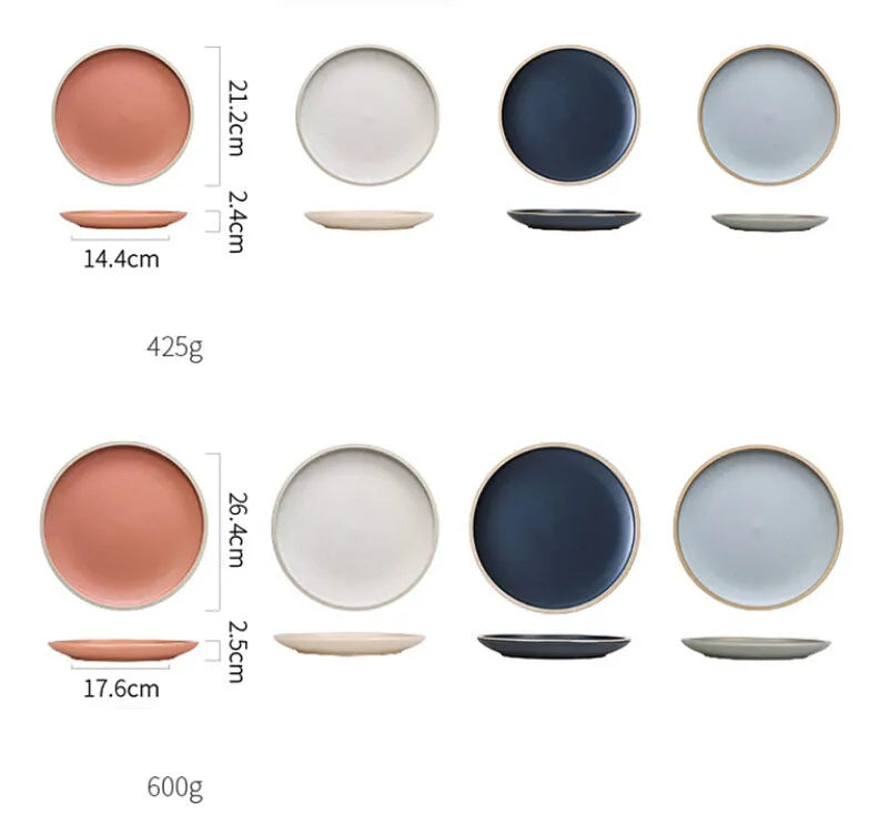 Blue matte ceramic plate with sesame point glaze on a table, 10 inch diameter.