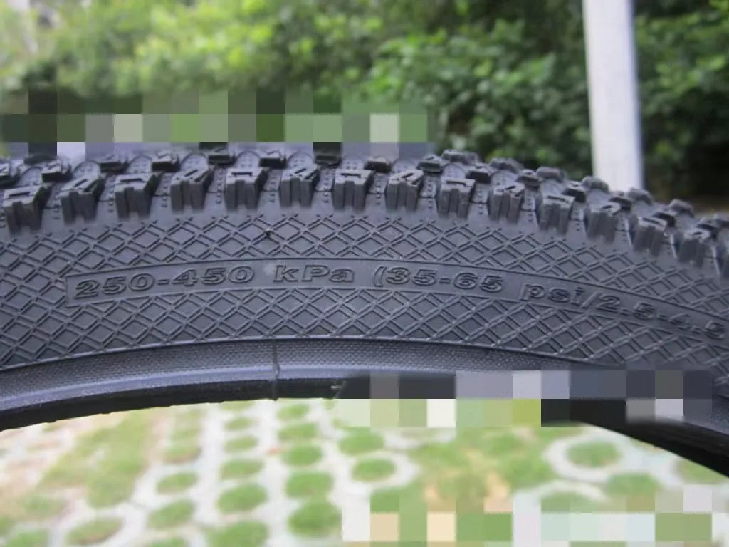 Mountain bike ultralight puncture proof tyre shown in black with white label sidewall option.