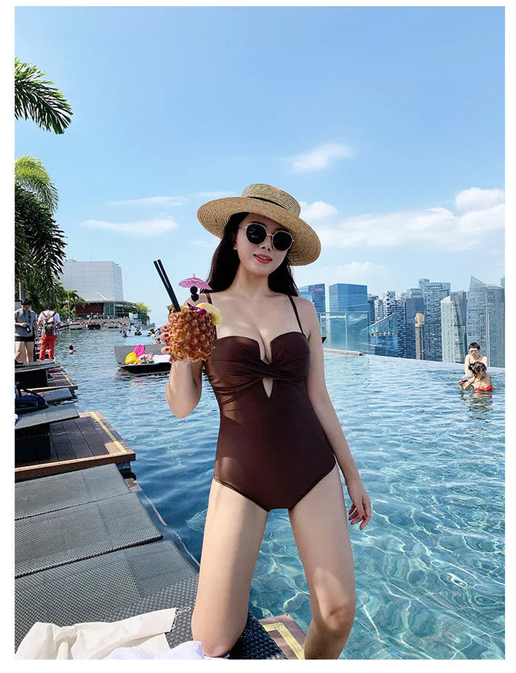 Solid colour small chest push-up spaghetti strap one-piece swimsuit in white, pink, and brown