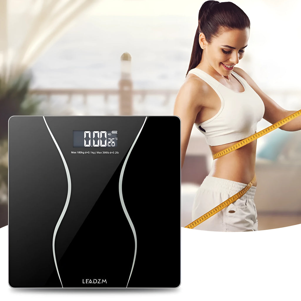 Black electronic body scale with digital display and 180kg weight capacity for household health monitoring