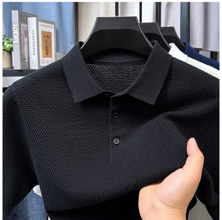 Loose pure cotton short sleeve pullover sweater in grey, shown laid flat.