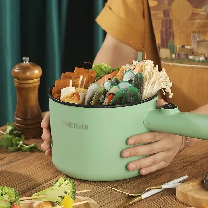 Mini hot pot electric cooker with stainless steel body, non-stick pot, available in green, compact size 12.7x17x15 cm
