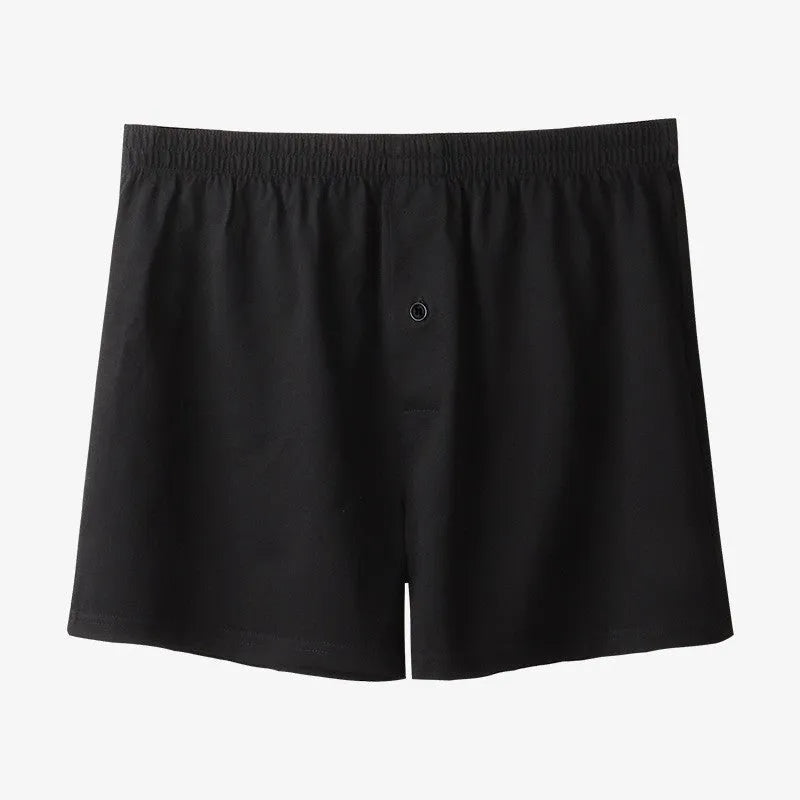 Men's light grey cotton boxer shorts with high waist and loose fitting design
