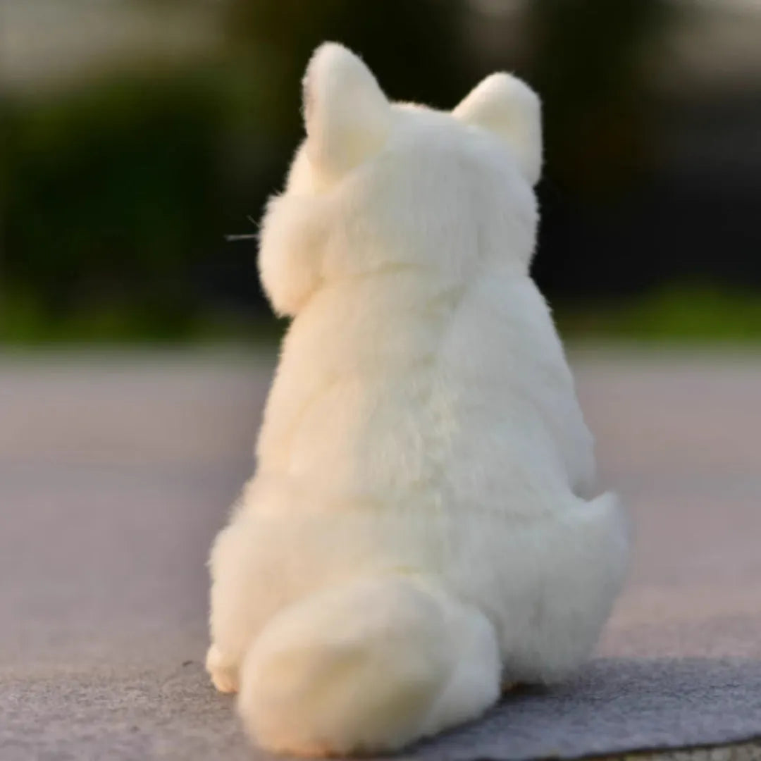 Soft plush toy animal doll approximately 25.5 cm tall in orange red colour, sitting firmly on a white desk surface