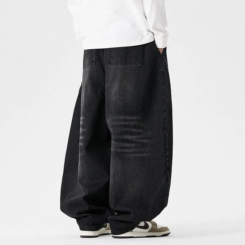 Men's plus size baggy jeans in light blue cotton denim with wide leg straight cut