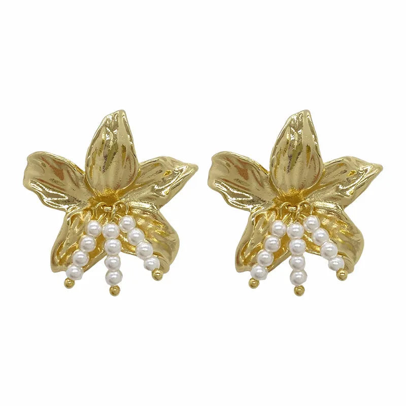 Gold H1795 metal flower earrings with pearl design and Seiko treatment