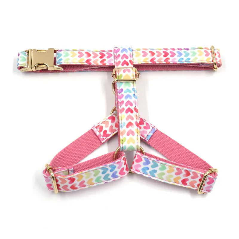 Pink colourful dog chest and back harness with gold buckle and heart-shaped stone on polyester strap