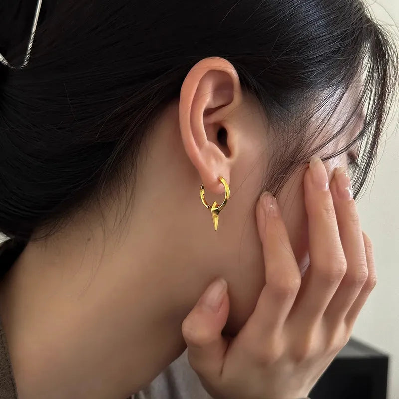 Geometric star design women's ear clips with copper construction and electroplated white gold finish