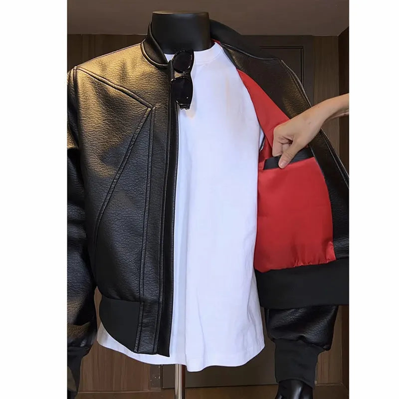 Men's black slim-fit PU leather jacket with extended 100cm length shown on model