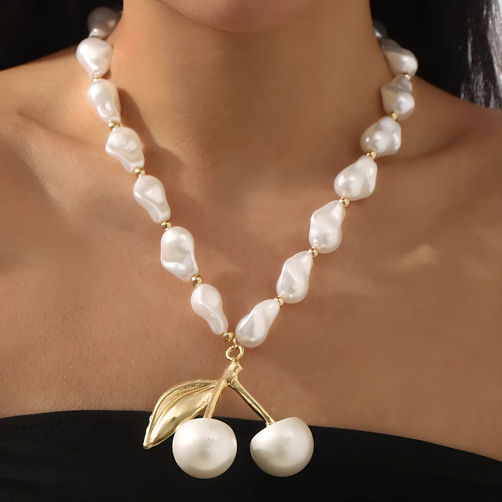Women's adjustable pearl cherry fruit necklace with gold electroplated finish showing fruit pendant details