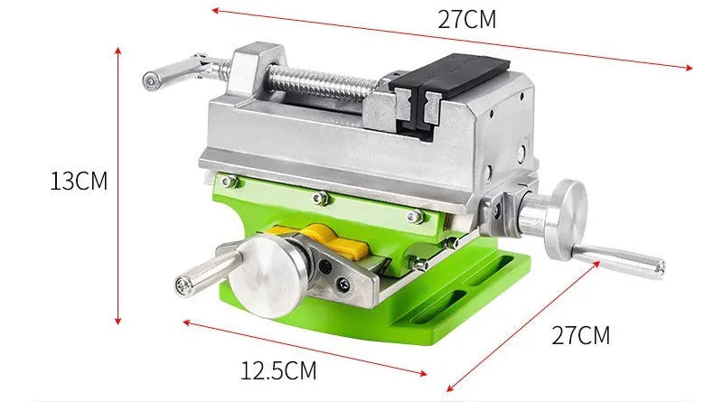 Bench drill and milling machine with cross bench pliers on workbench