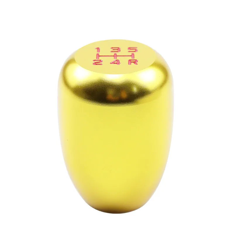 Universal aluminium gear shift head with 40mm diameter and 60mm height in titanium colour