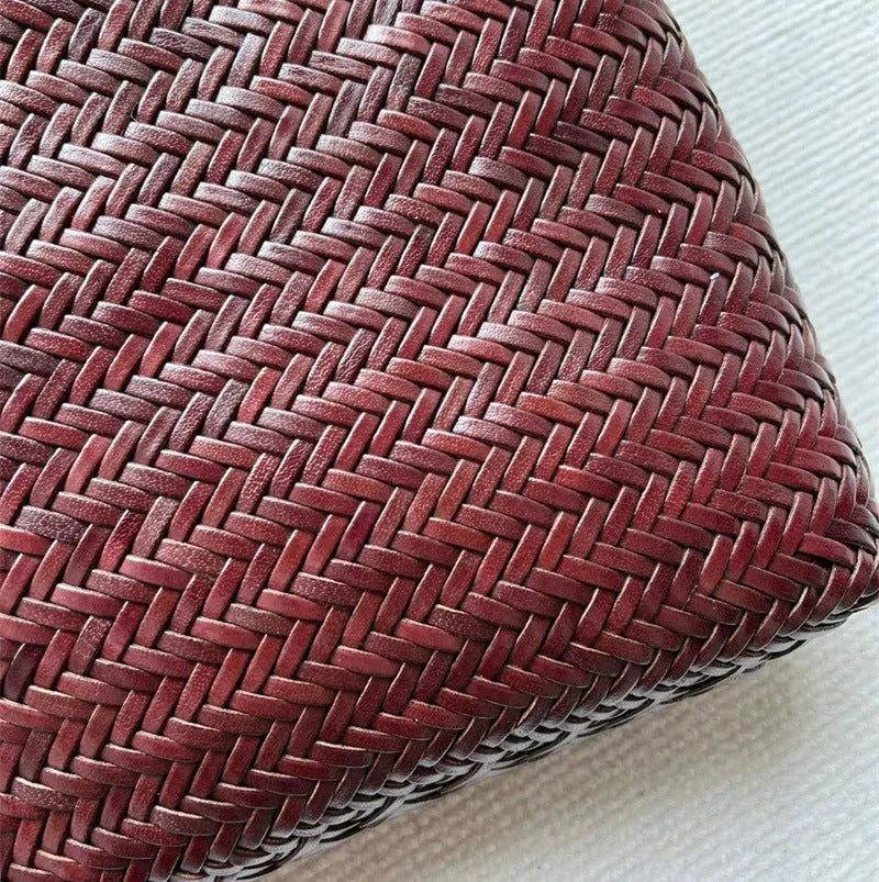 Handmade vintage woven leather shoulder bag in brown with three-dimensional pockets