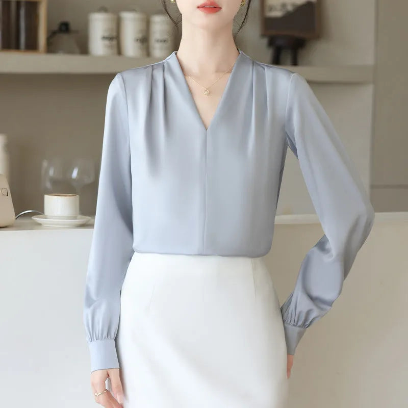 Solid colour women's long sleeve satin shirt with 3D stitching in blue and apricot