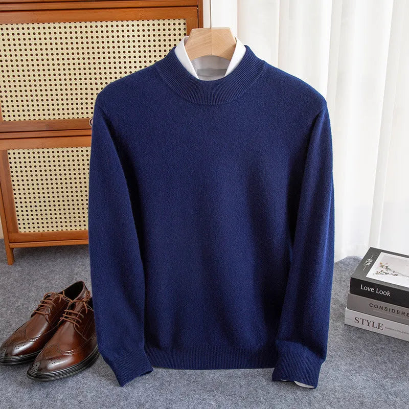Man wearing a loose-fit half-collar wool sweater in a dark colour, showcasing the knit texture and collar style.