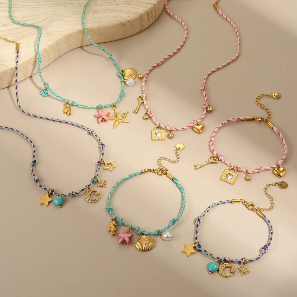Handmade braided rope titanium steel necklace or bracelet with 18K gold electroplating in purple, pink, or blue styles.