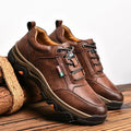 Men's British style round toe leather shoes with front lace-up and rubber sole, available in black and brown