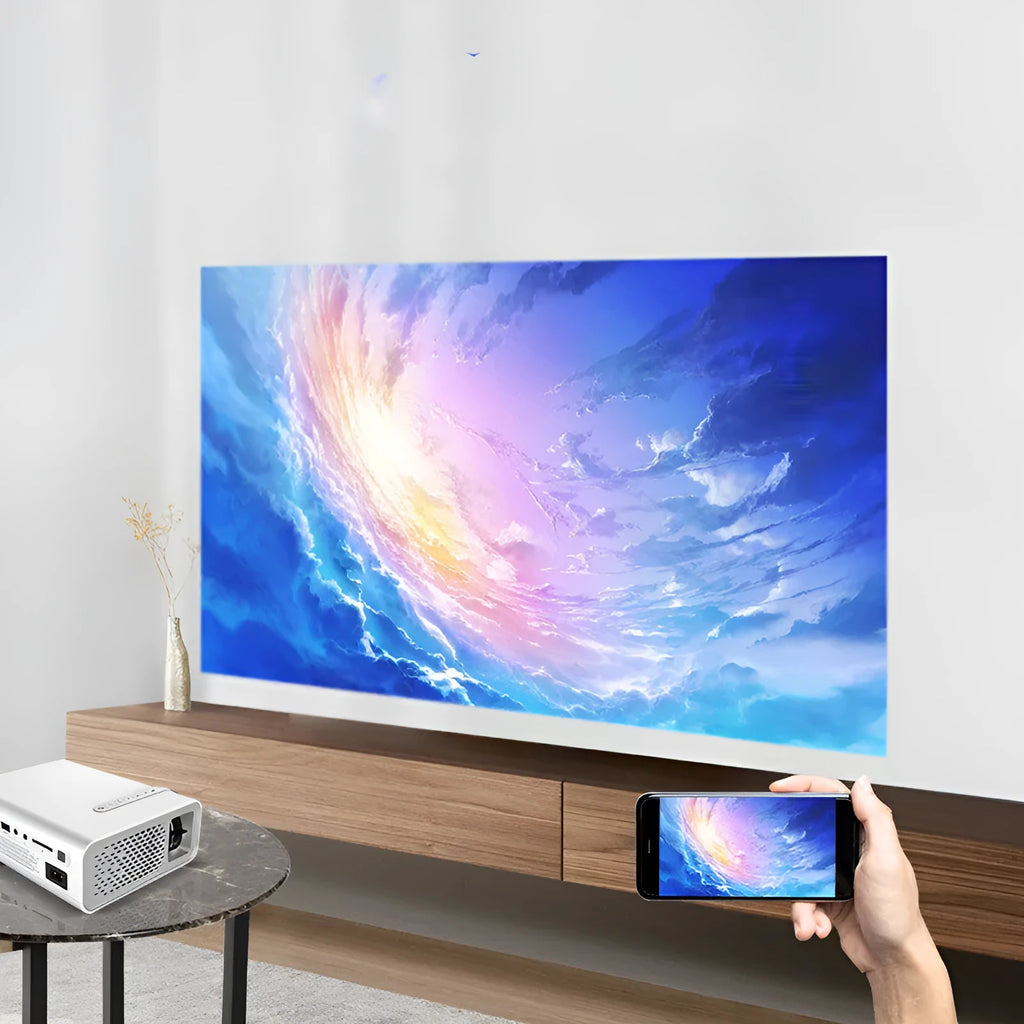 YG530 mini mobile phone projector in black or white with wireless connectivity for smartphones