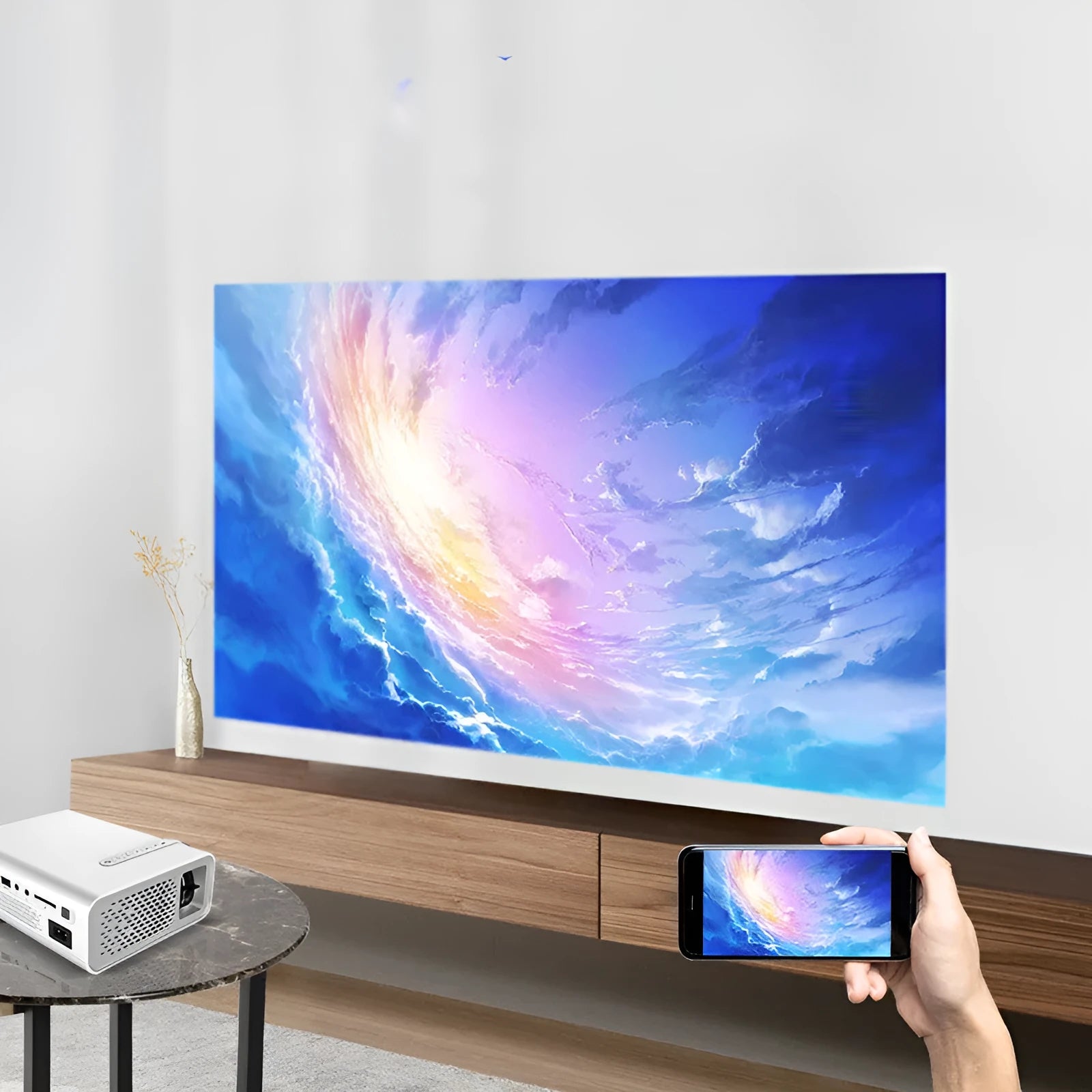YG530 mini mobile phone projector in black or white with wireless connectivity for smartphones