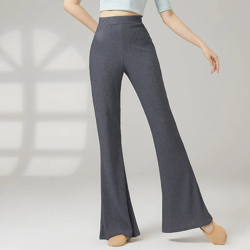 Close-up of solid colour polyester dance practice trousers for women, showing the form-fitting fit.