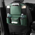 Leather car seat back storage bag in black colour mounted behind vehicle seat