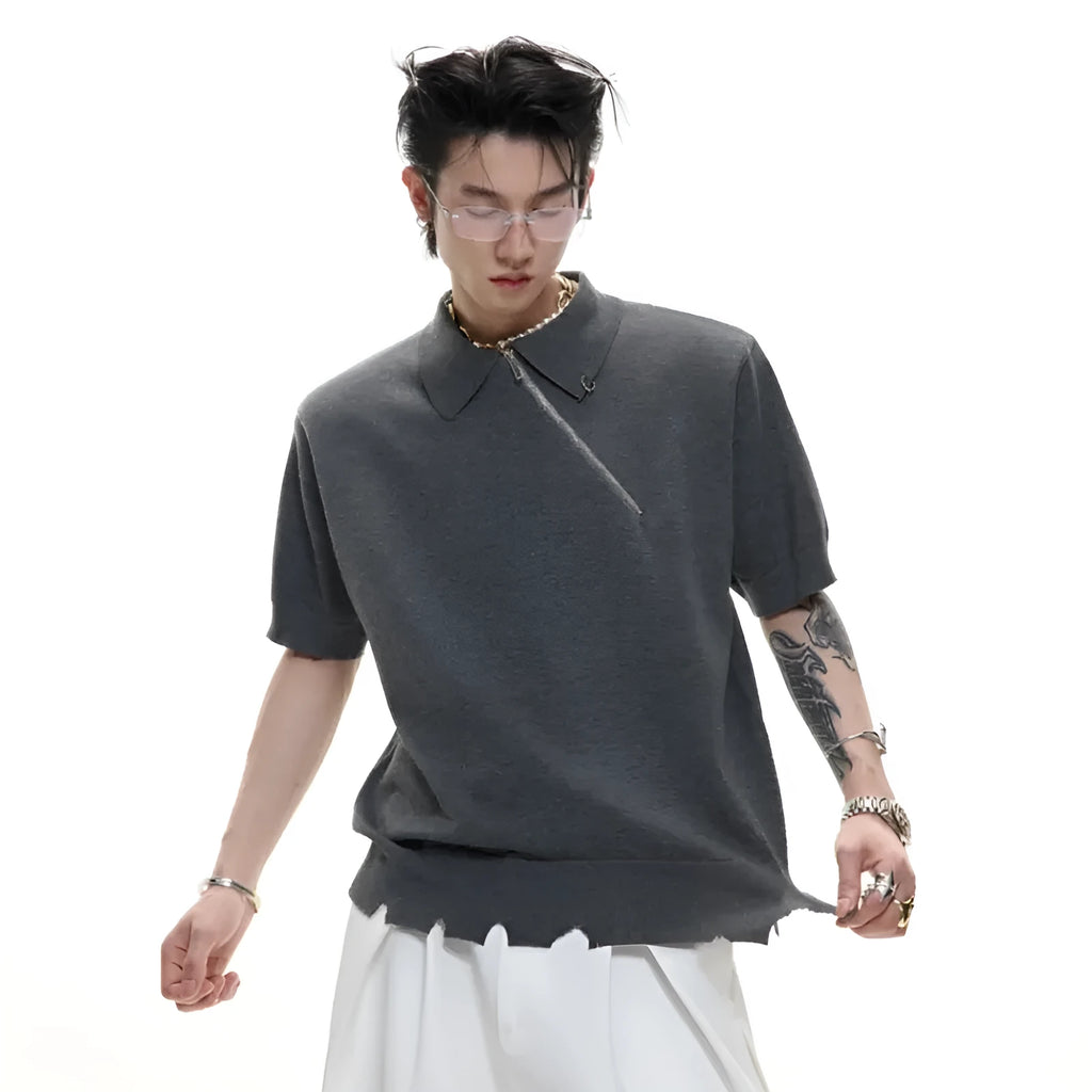 Slim fit grey knitted polo shirt with an oblique diagonal zip and short sleeves on a mannequin.