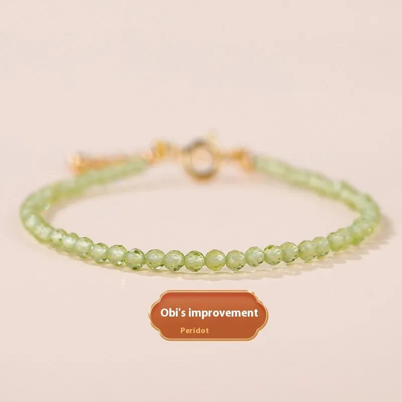 Natural strawberry quartz bracelet with 3mm polished diamond-cut beads on an adjustable cord