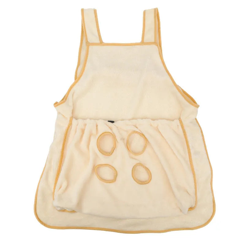 Plush pet carrier apron in beige with adjustable neck strap and head opening for small cats or dogs