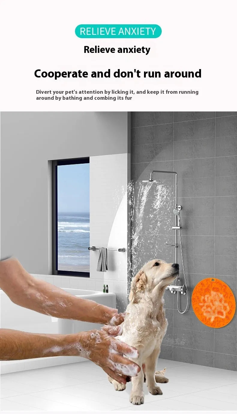 Round silicone pet licking mat with suction cup base in blue, on a kitchen tile floor.