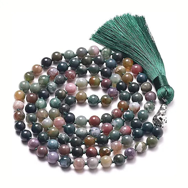 Long agate and amethyst tassel necklace with geometric beads in multiple colours on a 95-100cm chain.