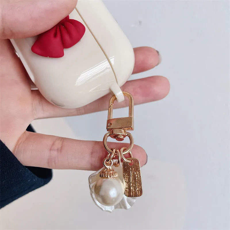 Beige red bow shell TPU case for AirPods Pro wireless earphones with clamshell design