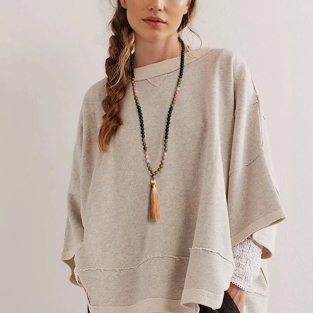 Handmade Bohemian long necklace with natural stone tassel and geometric mixed gem pendant.