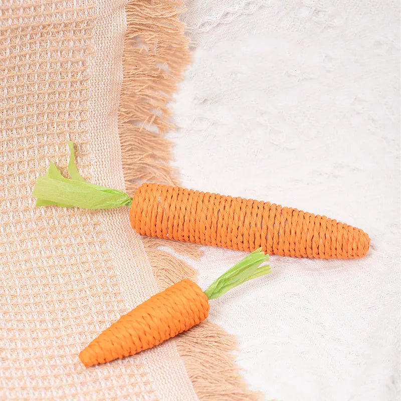 Assortment of cat toys including carrot shapes, paper balls, and grinding sticks in two size options