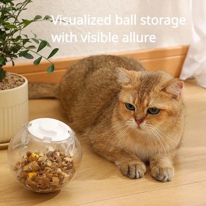 Blue slow feeding ball for cats and small dogs, 11.5cm ABS treat dispenser on floor