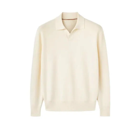 Man wearing a milky white pure wool polo sweater with a lapel collar.