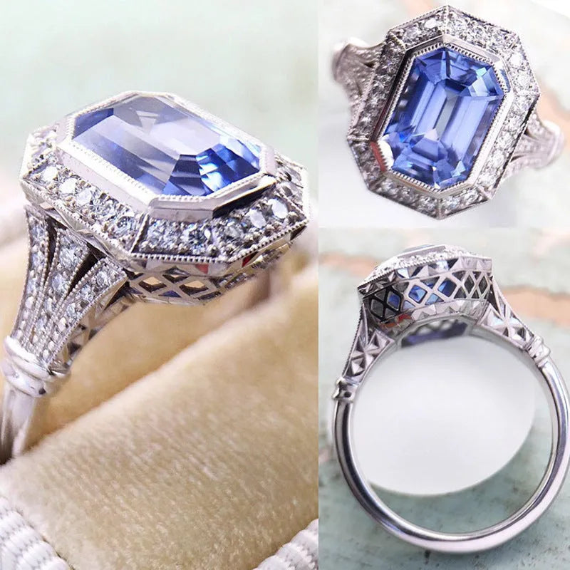 Blue long hexagon copper electroplated women's ring on plain background, sizes 6 to 10