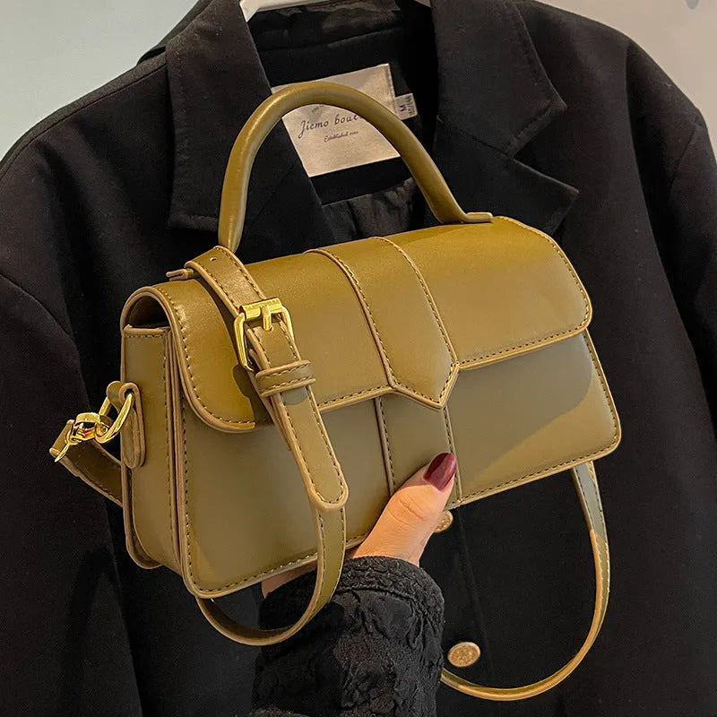 Women's beige PU messenger bag showing internal file organisation and sandwich pocket exterior
