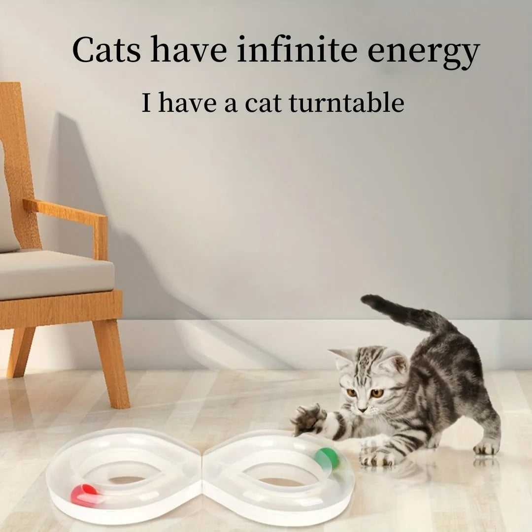 Blue and white cat turntable track ball toy with teasing stick on a flat surface.