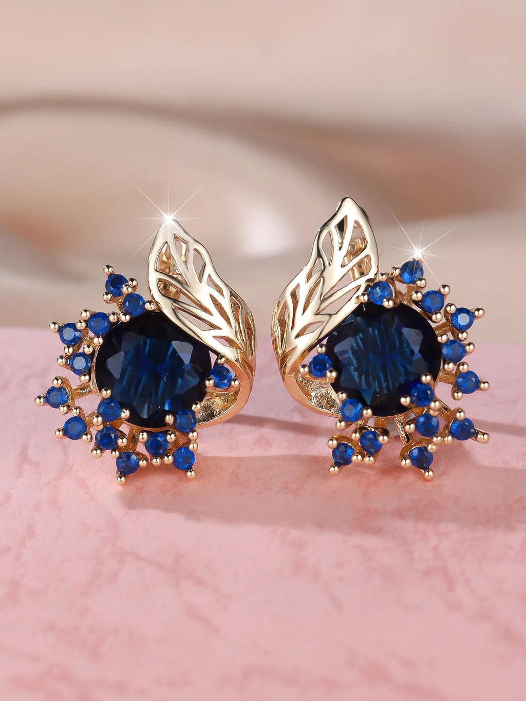 Round floral feather earrings with zircon stone centre in champagne gold finish, available in six coloured diamond options