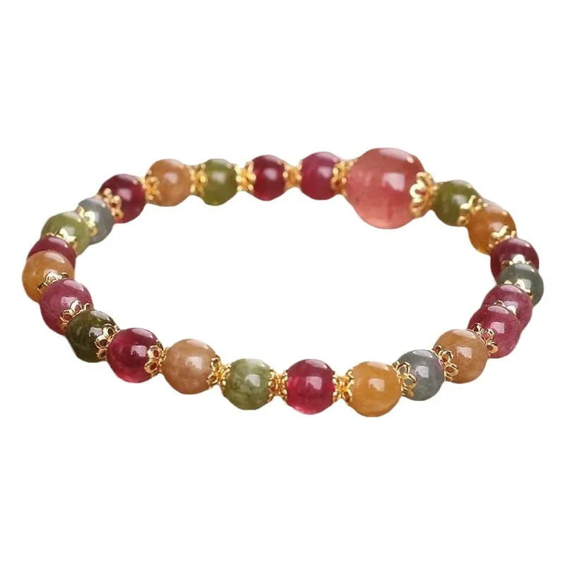 Natural tourmaline and strawberry quartz 10mm round bead unisex bracelet on neutral background