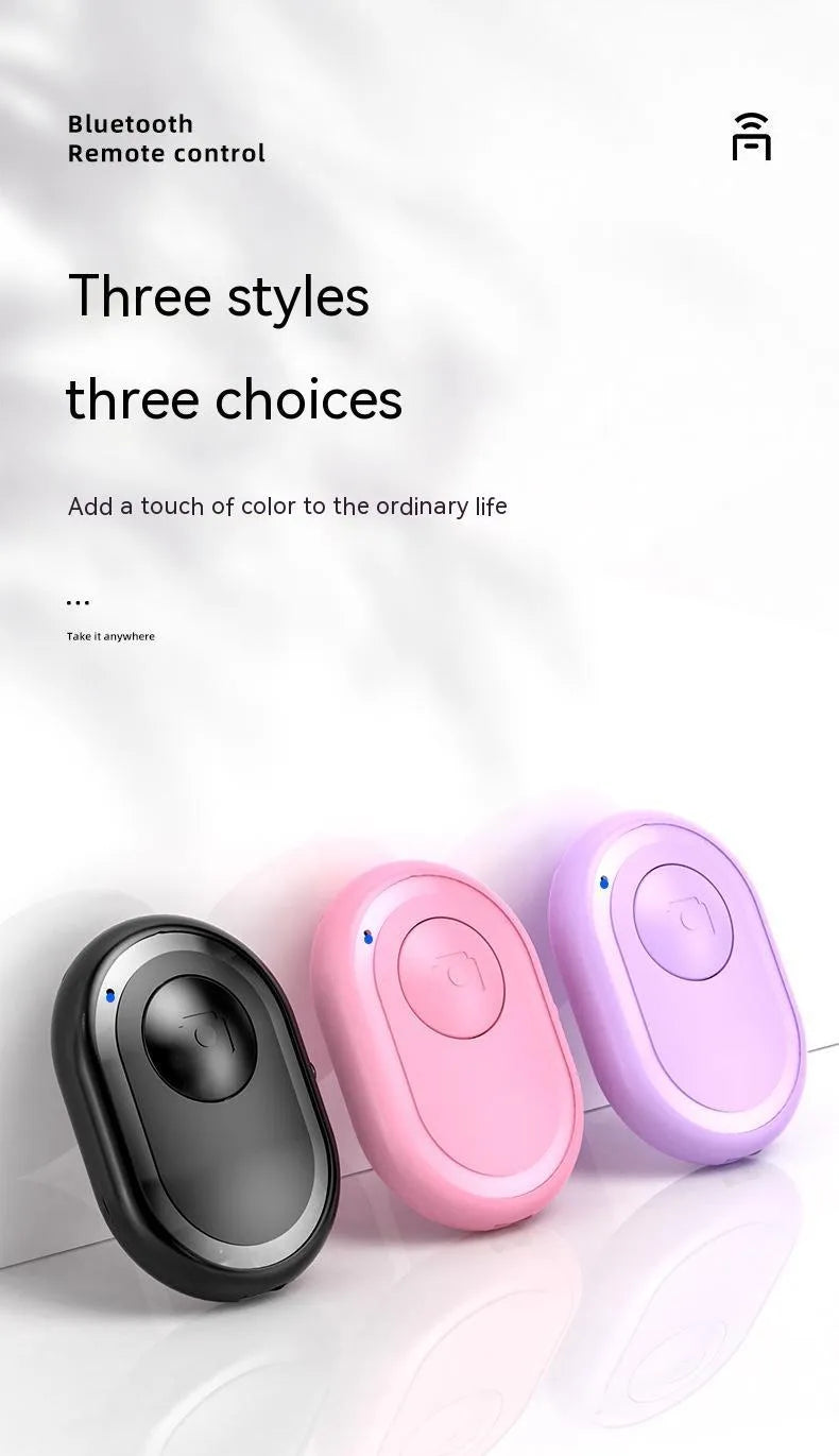Wireless Bluetooth remote self-timer photo control in black, plastic compact 48mm size