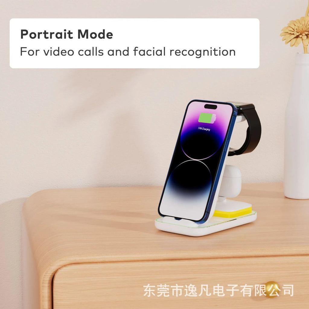 Black and white vertical wireless charging stand for mobile phone, smartwatch, and headset.