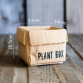 Cement flowerpot with drainage holes in a Nordic style, shown in a cement imitation carton finish.