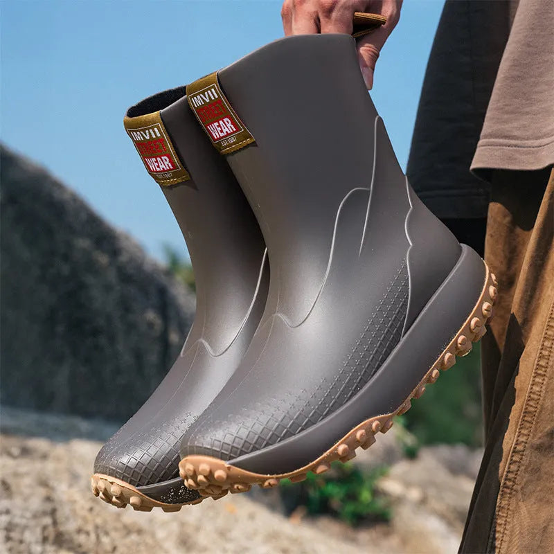 Men's mid low tube PVC rain boots in black, non-slip sole, flat heel, round toe